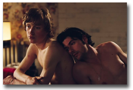 Scene from movie 'Time To Leave' of two men lying naked on the bed