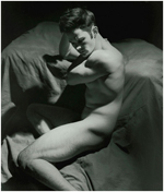 Classic black and white of a naked contorted male in sculpted down light